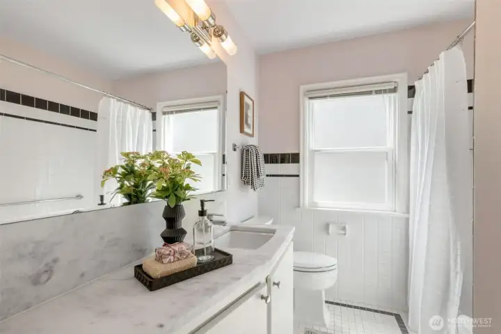 A full bathroom upstairs and a half bath downstairs.