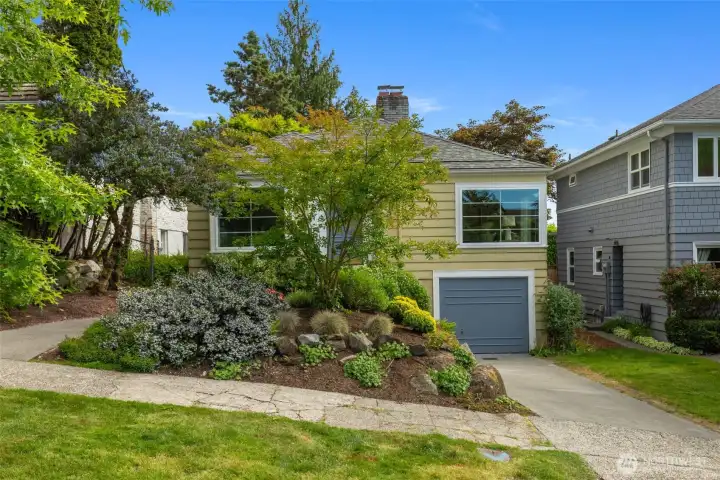 DREAMY LOCATION ALERT!! Opportunity Abounds in this Darling Laurelhurst Cape Cod! Just 40 steps from your front door to a secret pathway into Laurelhurst Park for summer camps, play, picnics, and endless pickleball. Secluded deadend street just off Laurelhurst's iconic boulevard! Charming 1937 details like coved ceilings, spacious living room, and proper and quaint dining room. 2 bedrooms + 3RD BEDROOM PRIMARY SUITE POTENTIAL in lower level. Lower level features bright and cozy rec room/office + room to expand. Walk to Children's, U Village, and nearby restaurants and shops along 45th/Sand Point. Get your nature fix just down the way with a stroll or a run in the lovely Center for Urban Horticulture with its endless surrounding trails and pathways along Lake WA - and don't miss the Burke-Gilman Trail nearby! Sweet, secluded, and mature backyard garden with perfect patio for whiling away the sunny days - all-season botanical interest nestles this cute-as-a-button home!