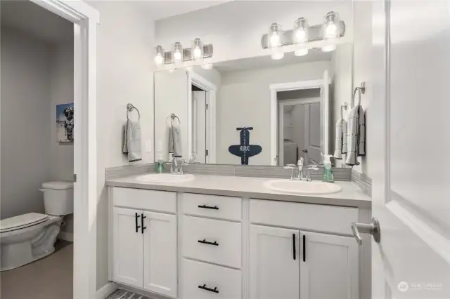 Full size bathroom with double sink vanity