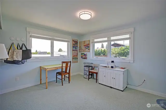 Large south facing bedroom with a customized closet space completes the main upper floor.