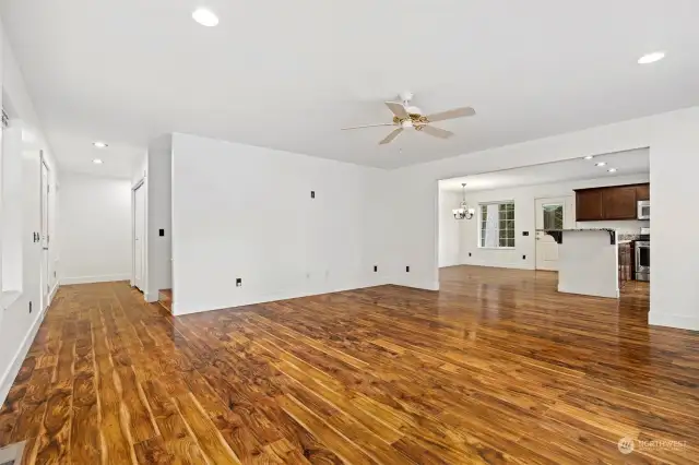 Bright open living room that opens up to the kitchen and dining area.