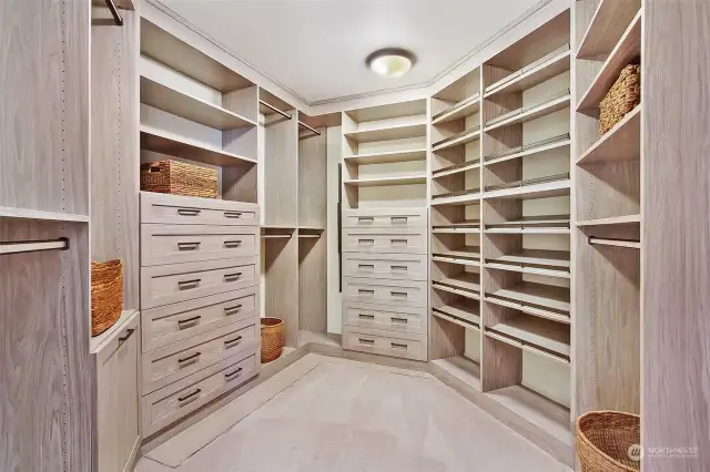 Custom designed, top of the line California Closets throughout this home. His and hers shoe racks, never-ending soft-close drawers and 3 walls of hanging space.