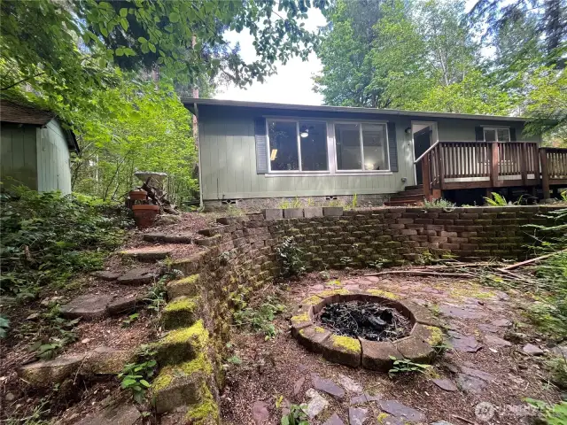 Relax in the forest around the firepit