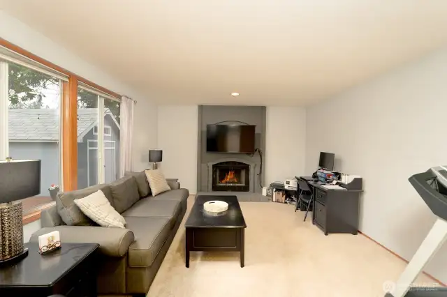 Comfortable family gathering space with fireplace