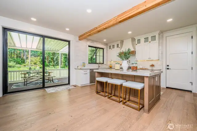 The kitchen flows beautifully into dining and living (great room) areas for effortless entertaining!