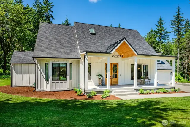 This spectacular home is sided with Hardie board & battan siding & was renovated top to bottom in 2021.  30 year composite roof, new gutters, Andersen Series 100 windows, covered front porch with metal roof, tongue & groove ceiling & dimmable recessed and chandelier lighting.