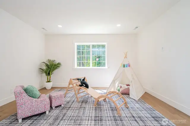 Upstairs bonus room--ideal for play, media or a second living space.