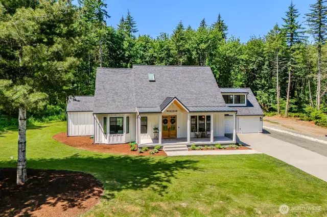Sited on a stunning 5 acre lot, surrounded by nature with private trails and a peaceful stream to explore. Quiet wooded surroundings offer pirvacy and peaceful views year-round.