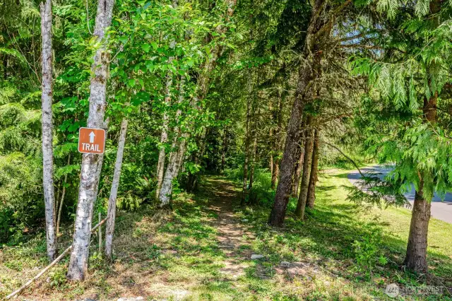 Wander through tranquil woods, explore the gentle stream, build forts, dream, breathe then rememeber... all the best trails lead to HOME!