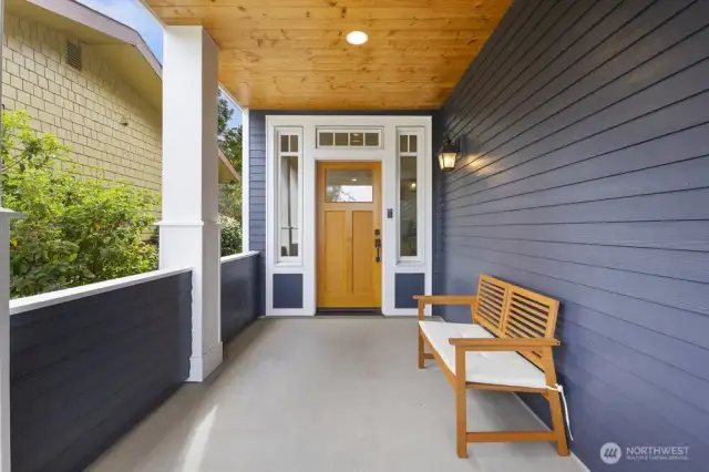 The home's inviting entry is framed by a generous covered porch, blending charm with function.  A front balcony, accessed from the living room, offers a private outdoor extension for quiet mornings or evening gatherings.