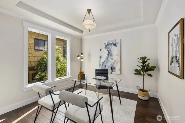 Just off the front entry, a large, light-filled office offers an inspiring space for work, study, or creative pursuits--all with the convenience of being near the heart of the home.