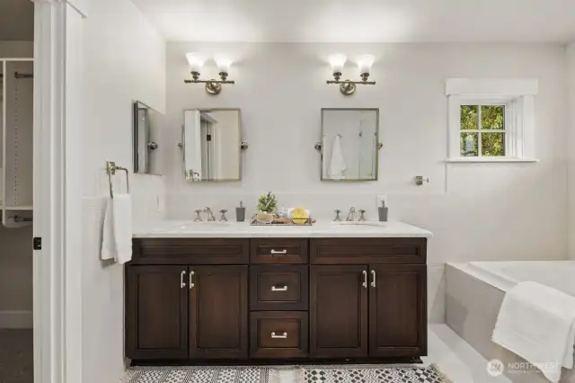 Primary ensuite full bathroom with Restoration Hardware fixtures.  Tiled floors have radiant heat.