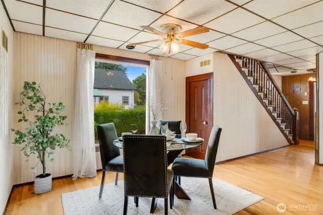 The dining area offers seamless access to the kitchen and living spaces for easy entertaining.