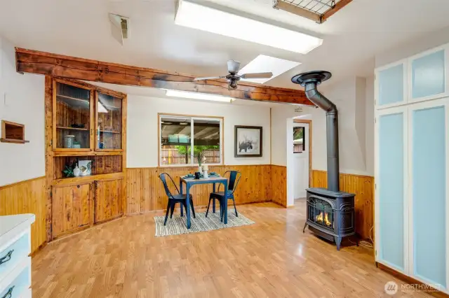 Enjoy your morning coffee in the cozy breakfast nook right off the kitchen. Built-ins accent this lovely space.