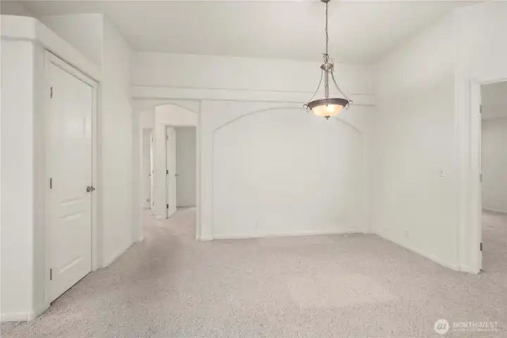 Dining room is just off the kitchen and large enough for your entertainment-sized table.