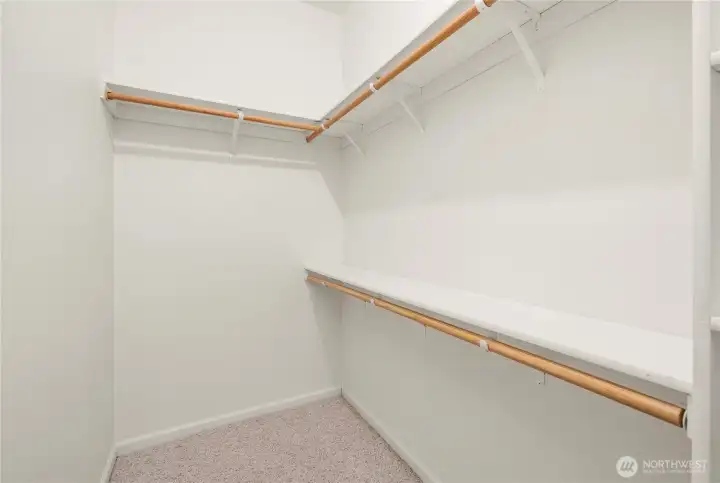 Primary suite's walk-in-closet.