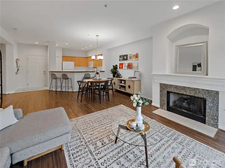 Vaulted ceilings and oversized windows fill the living space with natural light.