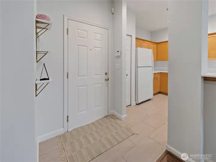 A view of the front door and entry way.