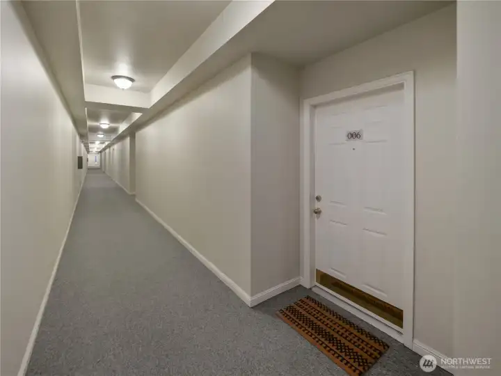 Another view of the front door from the secure interior hallway.