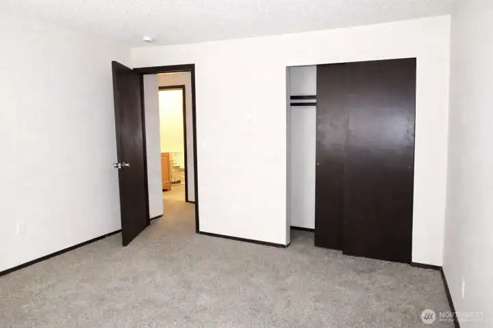 Bedroom number 3 at end of hallway! *Photo is from prior to current tenancy, home is fairly cluttered currently*