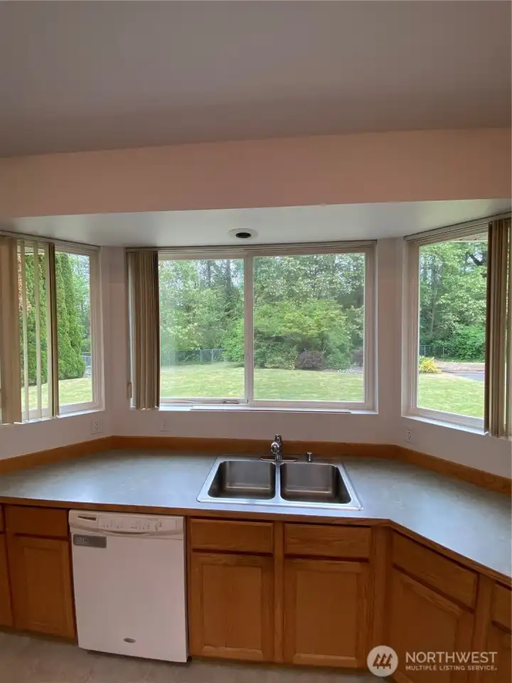 Oversized kitchen windows! Enjoy looking out onto your private backyard! Oversized kitchen windows! Enjoy looking out onto your private backyard!