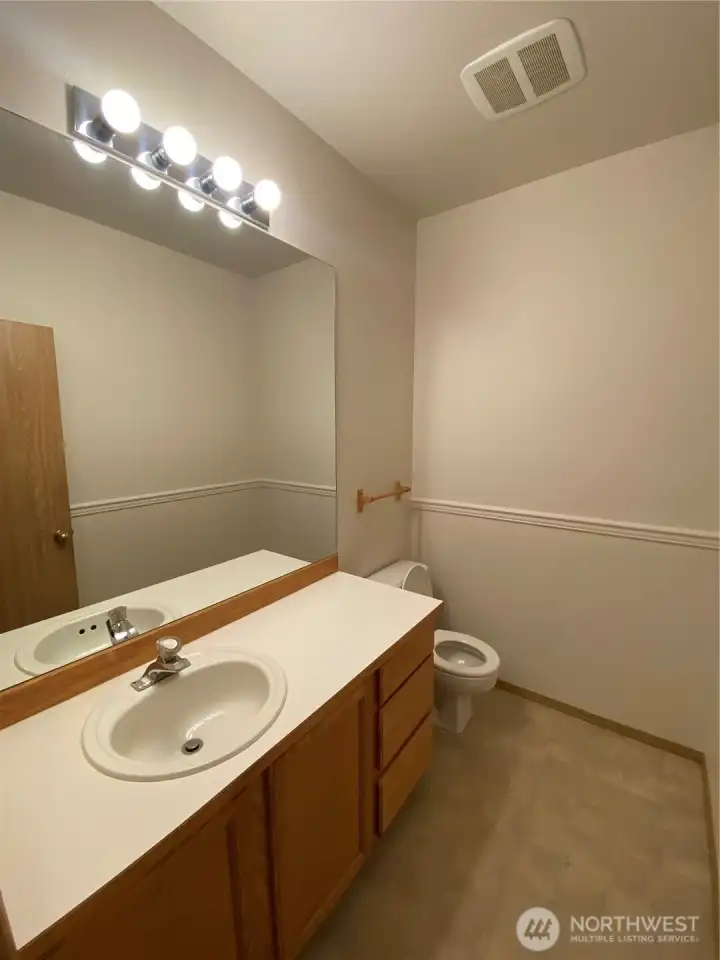 Half bath off of family room, perfect for guests! Half bath off of family room, perfect for guests!