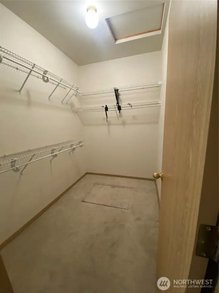 Primary walk-in closet Primary walk-in closet