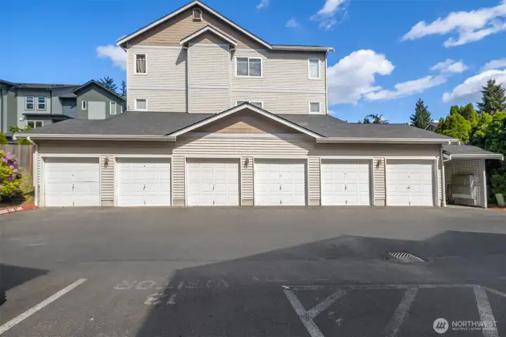 With an individual garage and additional assigned parking space.