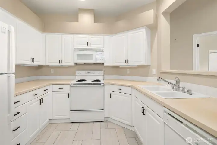 Large Kitchen with open concept and eat at bar.