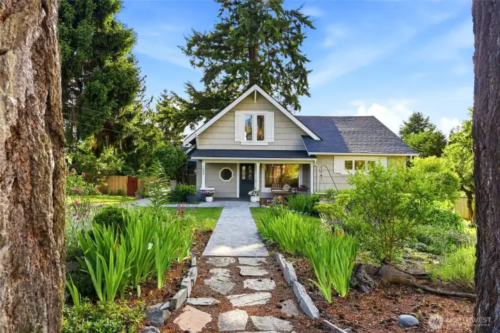 Charming 1916 home on a fantastic lot (.36 acres) with mature landscape.