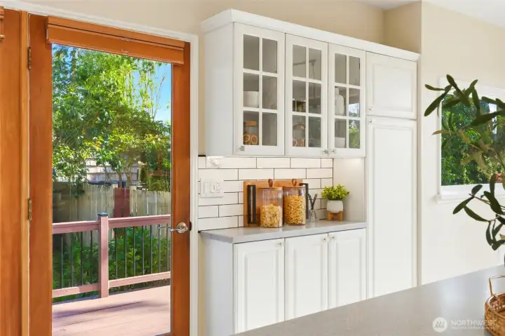 Side deck off of kitchen...perfect place for your BBQ.
