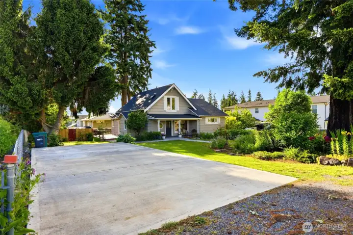 RV parking plus new concrete driveway with EV charging.