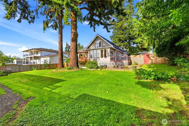 Expansive, fully fenced back yard.
