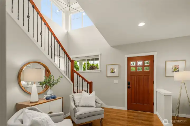 You are greeted by soaring high ceilings in the front entry.