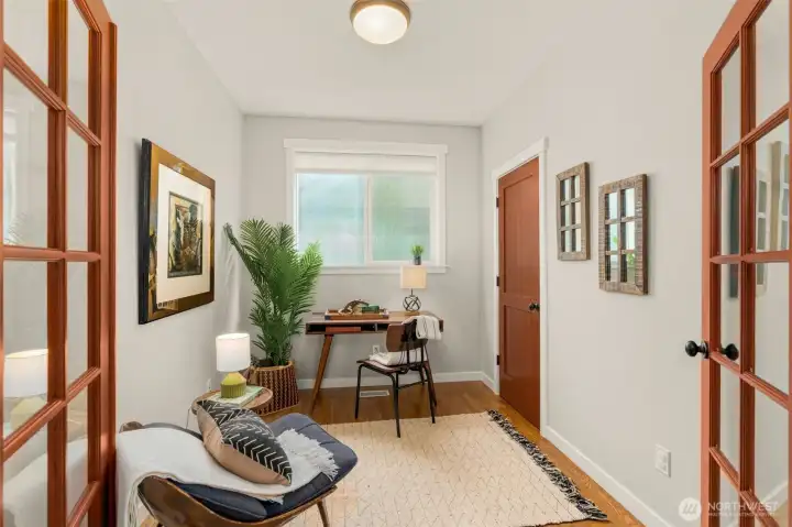 Enclosed room on main level could be an office or bedroom.