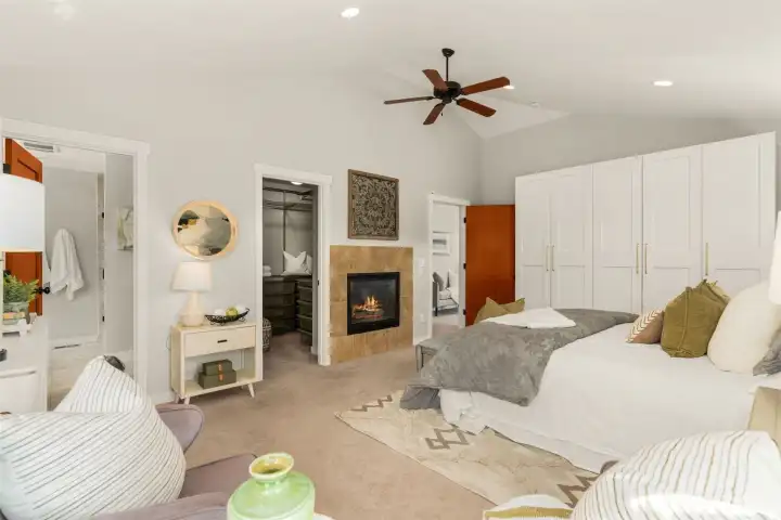 Gas fireplace in the primary suite, ceiling fan and added closet space in addition to the walk in closet.