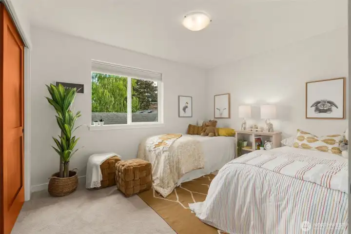 Spacious bedroom on the upper level.