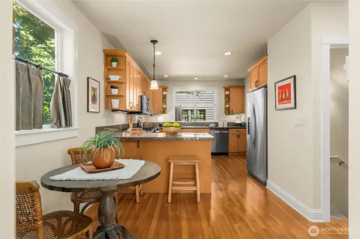 Clean and consistent hardwood floors throughout the main level