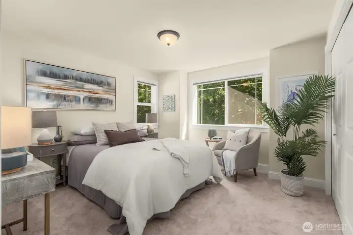 One of the three bedrooms on the upper level