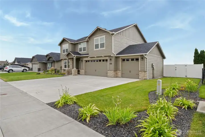 Spacious 3-car garage with plenty of parking.