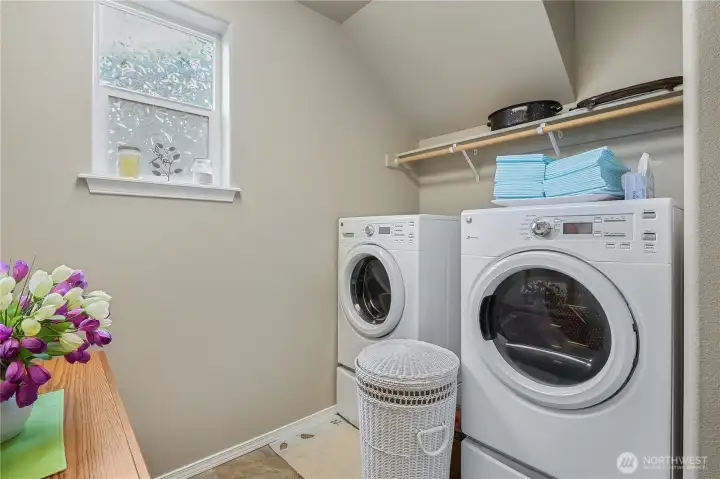 Convenient main-level laundry room adds everyday functionality.