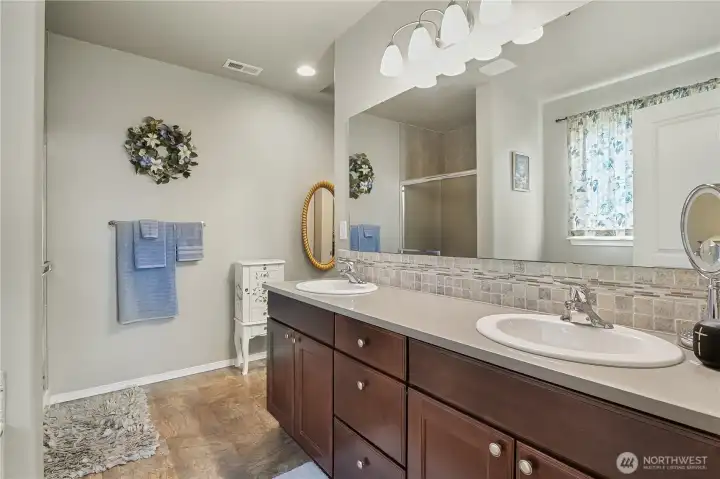Spacious primary bedroom with private ensuite.