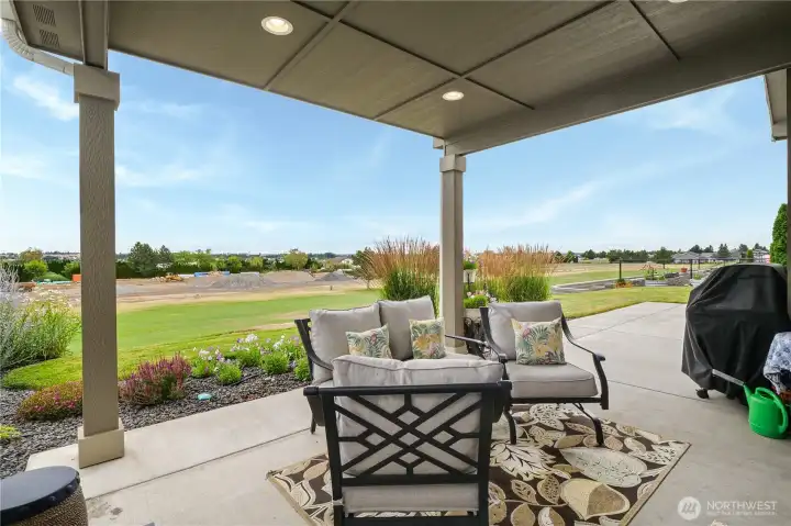 Enjoy views of the first fairway from your own backyard.