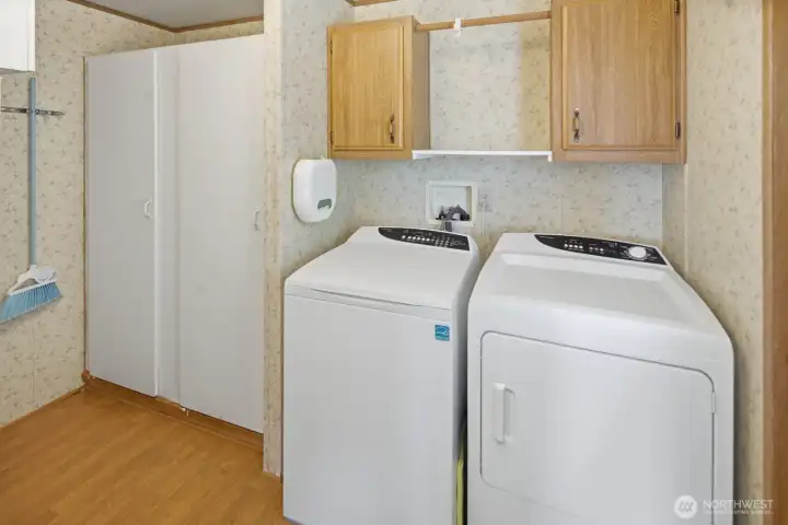Dedicated laundry area with overhead storage, 2 pantries and a place for a freezer Dedicated laundry area with overhead storage, 2 pantries and a place for a freezer