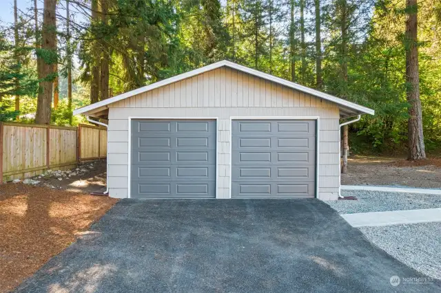 720 sq ft detached garage/shop with 8ft high doors