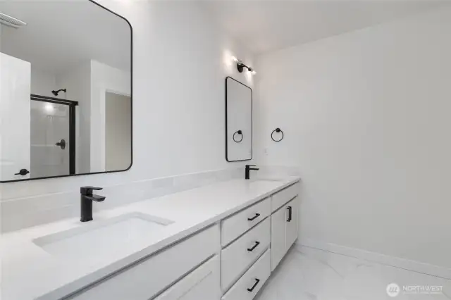 Upstairs Primary Bathroom - Pics are of a different 2834 plan. Features and colors may differ.