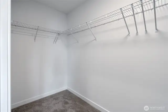 Upstairs Primary Walk-in Closet - Pics are of a different 2834 plan. Features and colors may differ.
