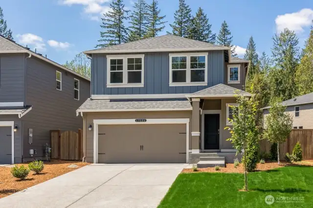 Sherwood Elevation B - photo of another home. Colors and materials Vary