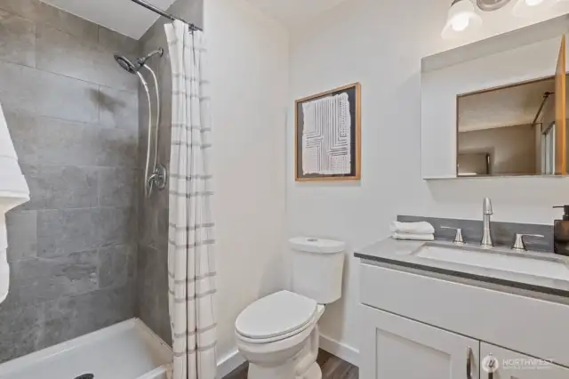 Updated primary bathroom with custom tile