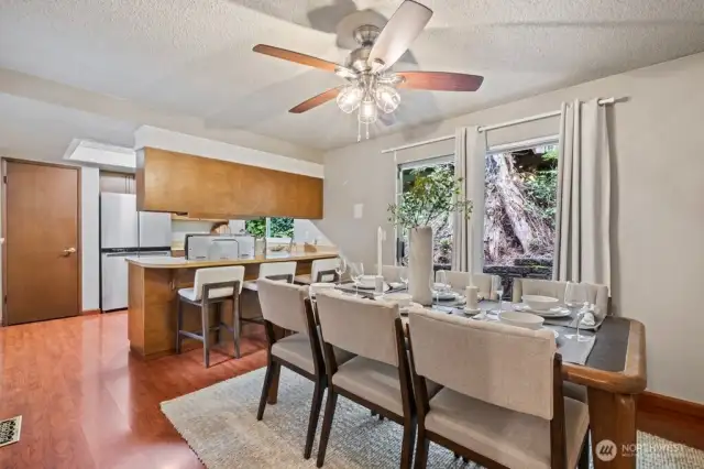 Generous kitchen and dining area with access to the multi-level deck great for BBQing!